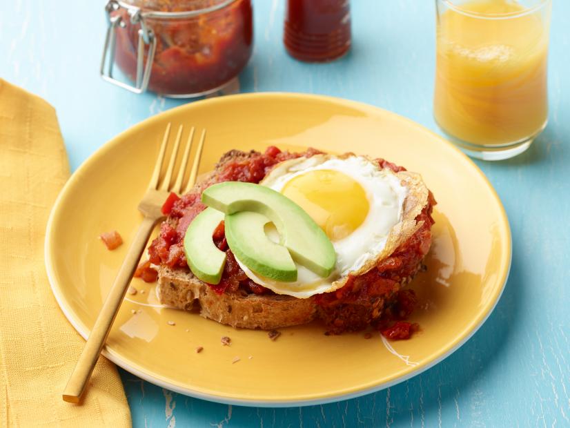 Food Network Kitchen’s Jammy Tomato Toast with Eggs and Avocado, as seen on Food Network.