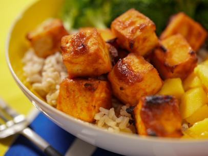 Katie Lee Biegel makes her Baked Curry Tofu, as seen on The Kitchen, Season 29.