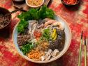 Chef Deana Saukam's Kuy Teav - Cambodian Pork and Seafood Noodle Soup, as seen on Food Network's Lunar New Year 2022