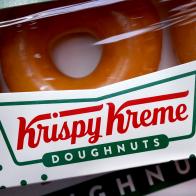 CHICAGO, ILLINOIS - MAY 05: Original Glazed doughnuts are sold at a Krispy Kreme store on May 05, 2021 in Chicago, Illinois. The doughnut chain reported yesterday that it plans to take the company public again. The company was taken public in 2000 but struggled before being acquired by JAB Holding Company in 2016. (Photo Illustration by Scott Olson/Getty Images)