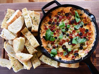 Close-up of Pizza Dip with Garlic Toast, as seen on the Pioneer Woman, season 30.