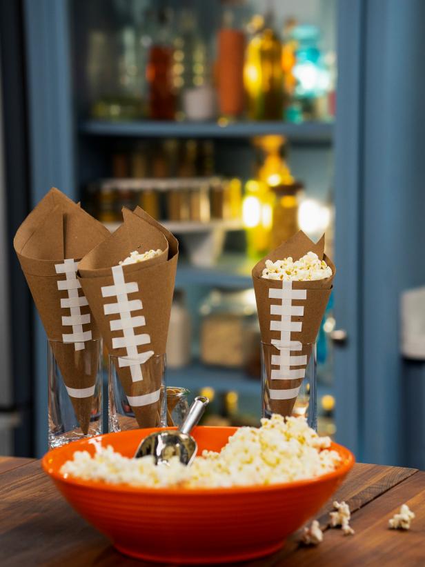 The Kitchen hosts share Touchdown Touches and make Football Popcorn Cones, as seen on The Kitchen, season 30.