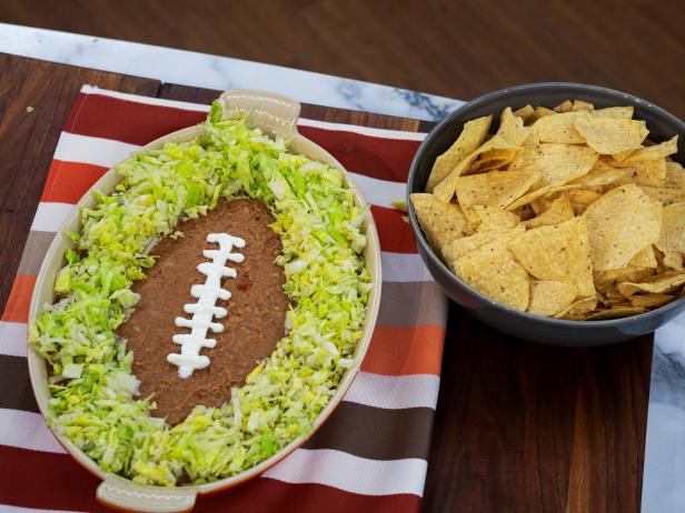 The Kitchen hosts share Touchdown Touches and make Seven Layer Football Dip, as seen on The Kitchen, season 30.