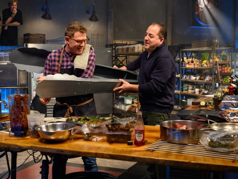 Co-Host Josh Capon checks in with Bobby Flay, as seen on Beat Bobby Flay, Season 29