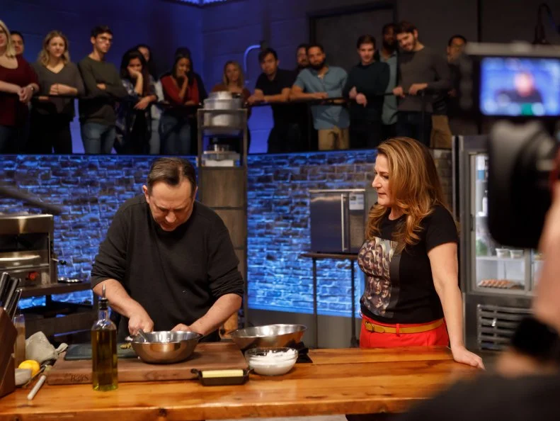 Behind the scenes as co-host Ana Gasteyer checks in with contender Danny Brown, as seen on Beat Bobby Flay, Season 27.