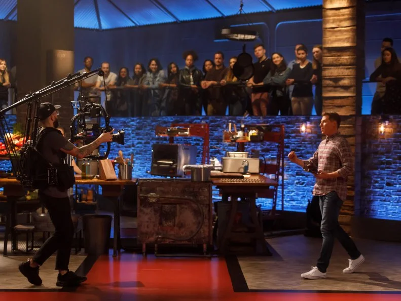 Behind the scenes of chef Bobby Flay entering with the Round 1 secret ingredient, as seen on Beat Bobby Flay, Season 28.