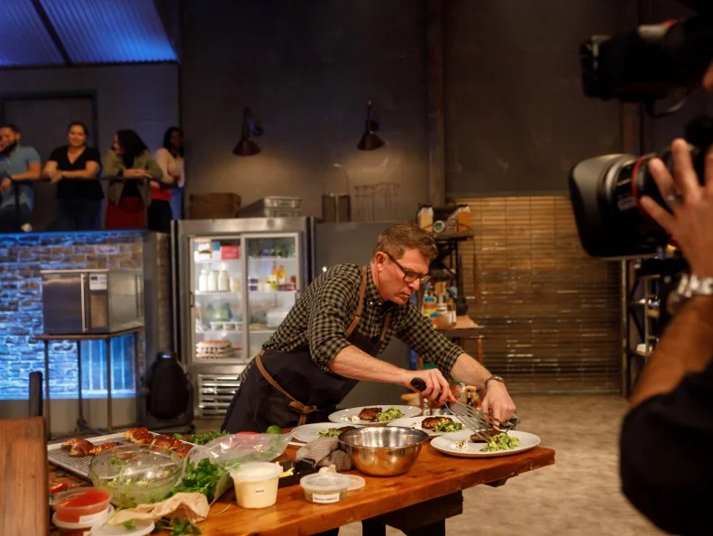 Behind the scenes of chef Bobby Flay adding the final touches to his Round 2 dish, as seen on Beat Bobby Flay, Season 29.