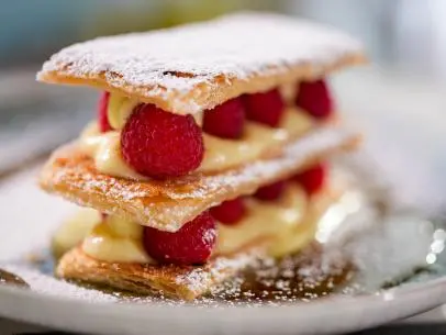 Geoffrey Zakarian makes his Mille Feuille with Vanilla Pastry Cream and Honey Bourbon Sauce, as seen on The Kitchen, season 30.