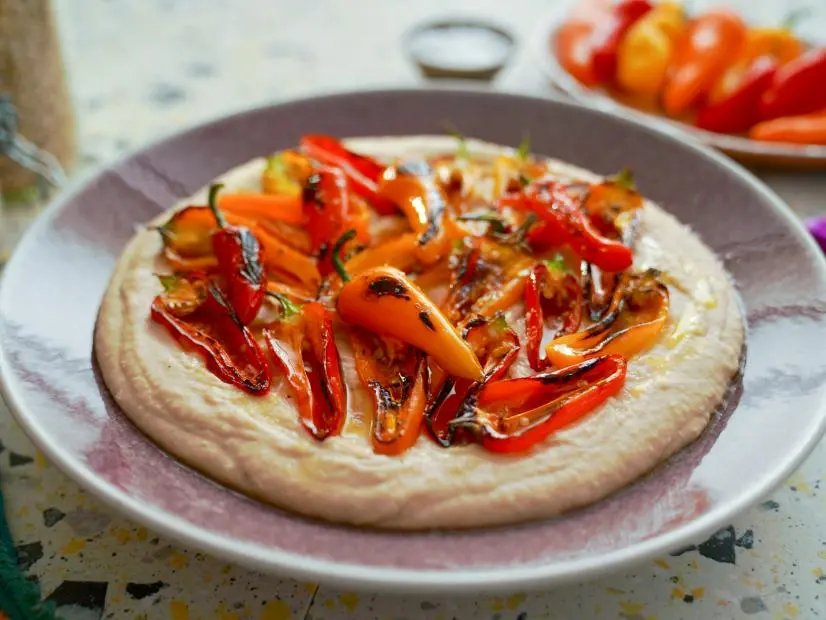 Beauty shot of Molly Yeh's Creamy White Bean Dip with Charred Peppers, as seen on Girl Meets Farm, season 10.