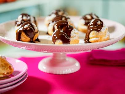 Alex Guarnaschelli makes her Classic Filled Cream Puffs with Chocolate Sauce, as seen on The Kitchen, season 30.