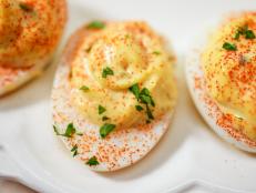 I love deviled eggs. Love. I always say, &ldquo;It&rsquo;s not a party at my house without deviled eggs.&rdquo; It&rsquo;s hard to beat the classic rendition, but every now and then I&rsquo;ll mix things up. I came up with this recipe for a dinner I cooked at the South Beach Wine and Food Festival, where I topped them with fried oysters. They&rsquo;re obviously delicious that way (anything fried, am I right?), but I like them just as well without the garnish. I&rsquo;ve made them with lemon and capers so many times now, I have almost forgotten what they taste like plain!