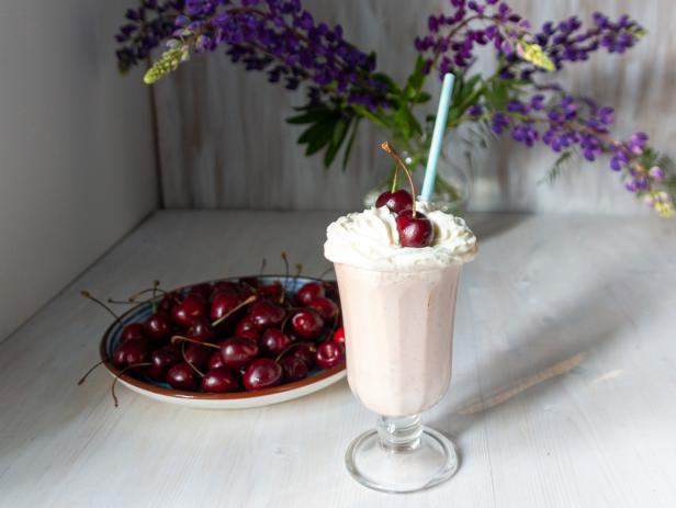still life with smoothie, berry, flower
