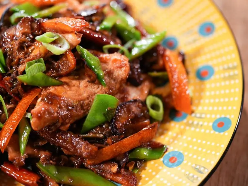 Alex Guarnaschelli makes her Orange Peel Chicken, as seen on Food Network's The Kitchen