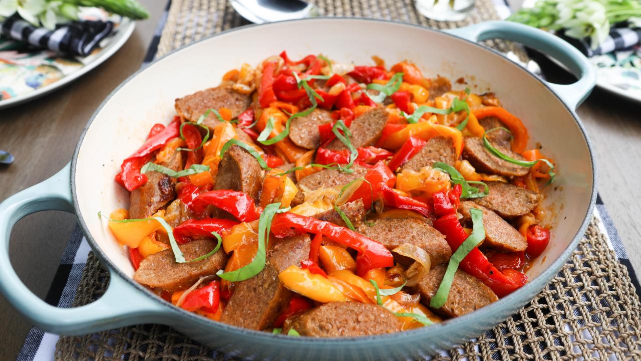 https://food.fnr.sndimg.com/content/dam/images/food/fullset/2022/03/29/0/VB1303_valerie-bertinelli-sausages-with-peppers-and-onions-2_s4x3.jpg.rend.hgtvcom.1280.720.suffix/1648577801460.jpeg