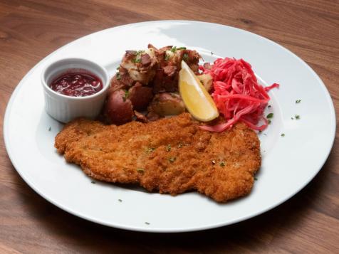 Pork Schnitzel with Lingonberry Sauce, German Potato Salad and Braised Cabbage
