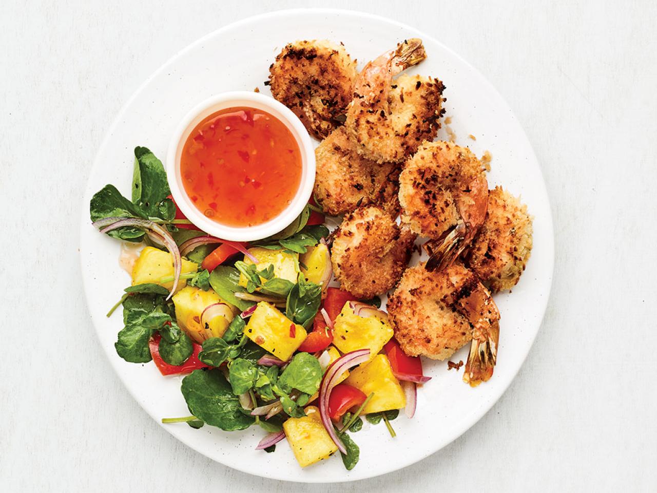 https://food.fnr.sndimg.com/content/dam/images/food/fullset/2022/04/12/0/FNM_050122-Air-Fryer-Coconut-Shrimp-with-Pineapple-Salad_s4x3.jpg.rend.hgtvcom.1280.960.suffix/1649790182920.jpeg