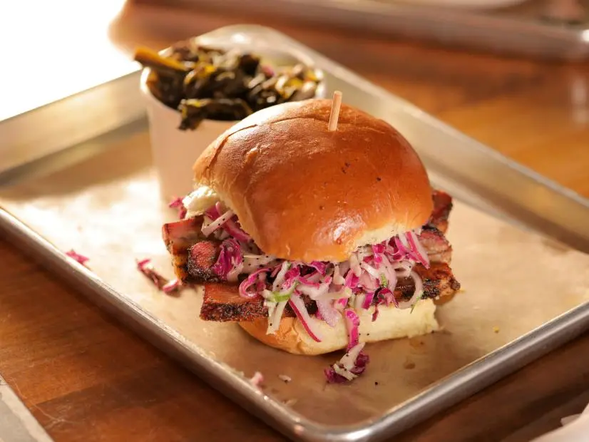 The Pork Belly Sandwich as served at Mabel's BBQ, as seen on Diners, Drive-Ins and Dives, season 35.