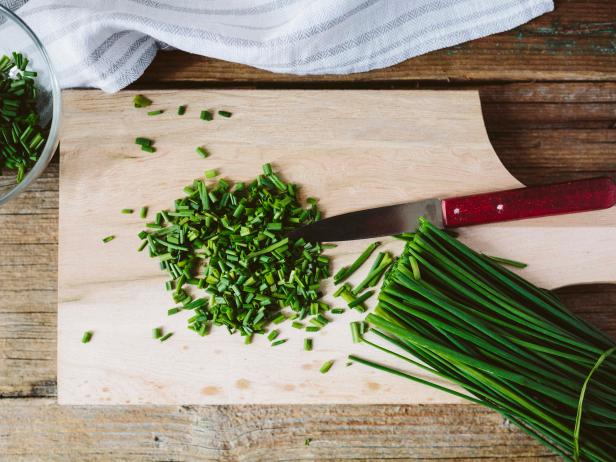 Chives on a wooden board