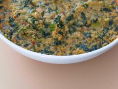 Nigerian Fonio Acha supper grain porridge prepared with vegetables and fish - Gluten Free