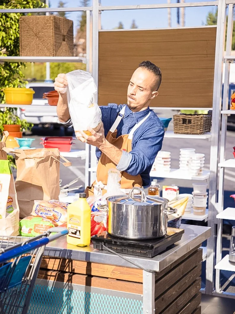 Chef Kris unpacking his groceries, as seen on Supermarket Stakeout, Season 3.