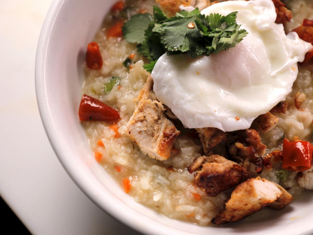 https://food.fnr.sndimg.com/content/dam/images/food/fullset/2022/05/18/DV3511-chicken-arroz-caldo-fat-cats-cleveland-ohio_4x3.JPG.rend.hgtvcom.1280.960.suffix/1652881945567.jpeg