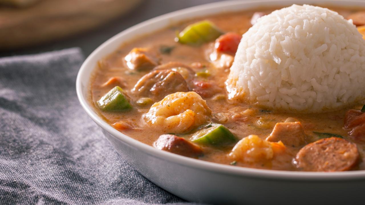 https://food.fnr.sndimg.com/content/dam/images/food/fullset/2022/05/25/gumbo-on-blue-linnen.jpg.rend.hgtvcom.1280.720.suffix/1653511529684.jpeg