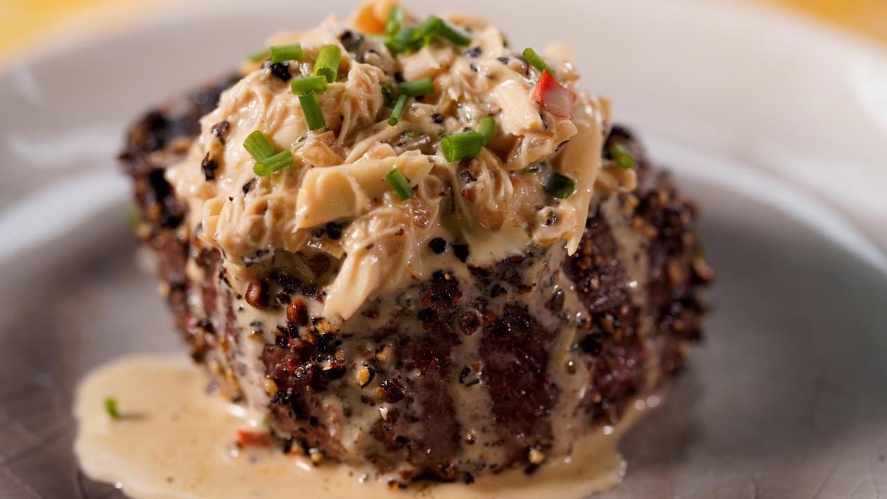 https://food.fnr.sndimg.com/content/dam/images/food/fullset/2022/05/31/KC3101-jeff-mauro-and-geoffrey-zakarian-chicago-steakhouse-peppercorn-crusted-filet-and-crab-au-poivre_4x3.jpg.rend.hgtvcom.1280.720.suffix/1654011238147.jpeg