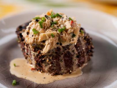 Jeff Mauro makes his Chicago Steakhouse Peppercorn-Crusted Filet and Geoffrey Zakarian makes his Crab Au Poivre, as seen on The Kitchen, Season 31.