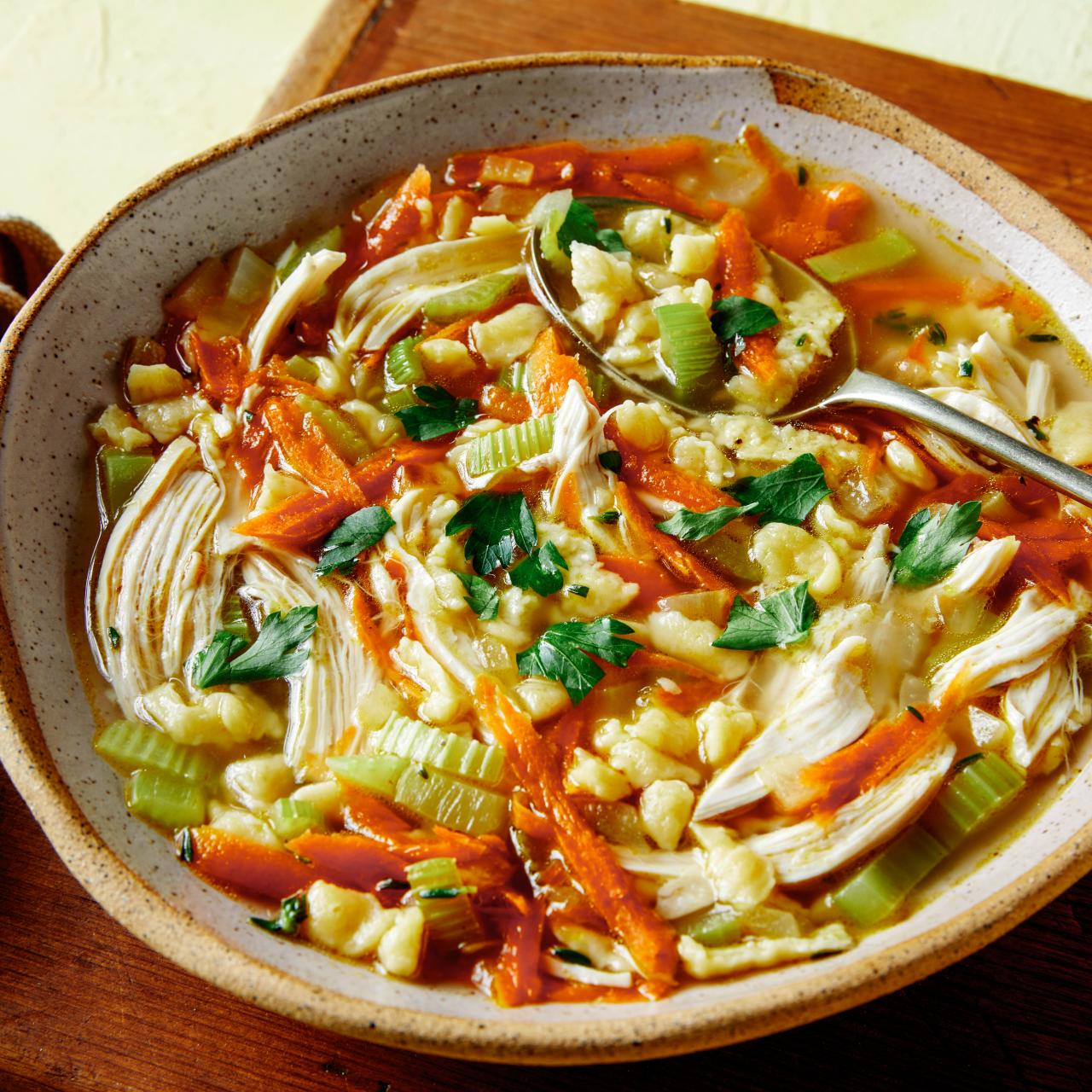 https://food.fnr.sndimg.com/content/dam/images/food/fullset/2022/06/03/0/FNK_Grated-Pasta-Chicken-Soup_H2_s4x3.jpg.rend.hgtvcom.1280.1280.suffix/1654270358975.jpeg