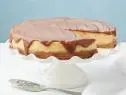 Food Network Kitchen’s Cheddar Cheesecake with Apple Butter Caramel, as seen on Food Network.