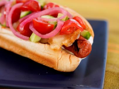 Jeff Mauro makes his Greek Style Flaming Cheese Hot Dog in The Kitchen's Top Dog Hot Dog Challenge, as seen on The Kitchen, Season 31.