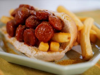 Sunny Anderson makes her Winning Currywurst-Style Hot Dog in The Kitchen's Top Dog Hot Dog Challenge, as seen on The Kitchen, Season 31.