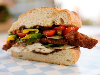 The Kitchen hosts pass the Pork Milanese Sub, as seen on Food Network's The Kitchen, Season 31