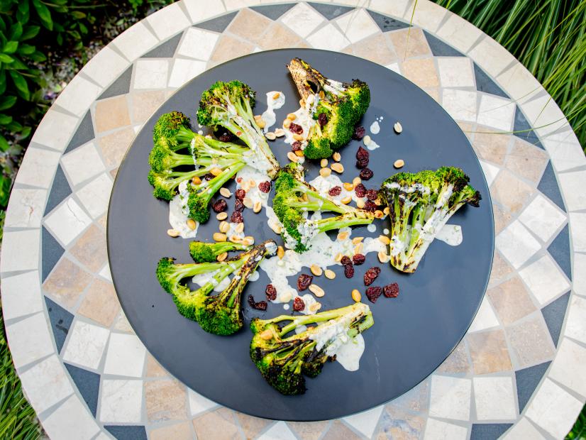 Host Michael Symon's Cast Iron Charred Broccoli Salad, as seen on Symon's Dinners Cooking Out, Season 3.