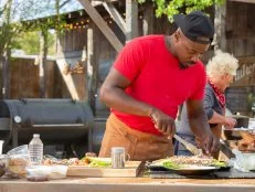 Contender Rashad Jones plates one of his final dishes, as seen on BBQ Brawl, Season 3.
