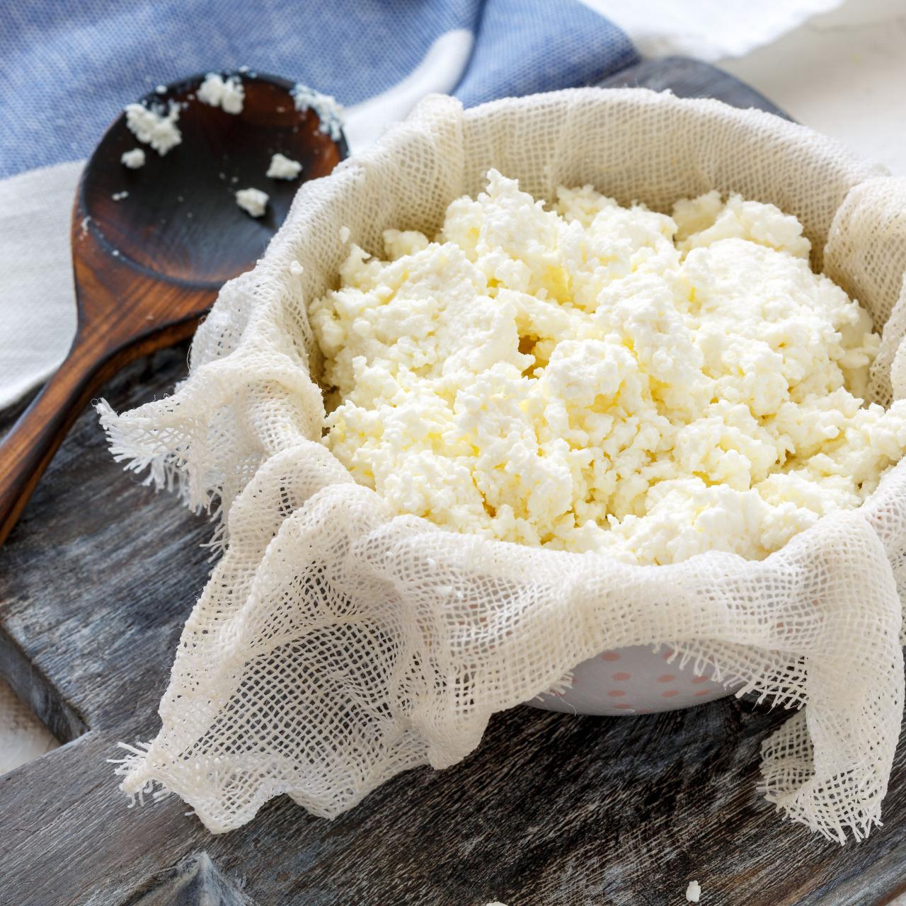 https://food.fnr.sndimg.com/content/dam/images/food/fullset/2022/06/23/cheesecloth-bowl-cheese-curd-wooden-spoon-wood-surface-linen.jpg.rend.hgtvcom.1280.1280.suffix/1655962768767.jpeg