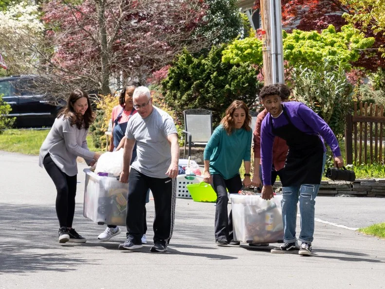Chefs Angie Shaghaghi and AJ Oliver grab cooking ingredients with the Rutigliano and Gul Families during Round 1, as seen on Kitchen Crash, Season 2.