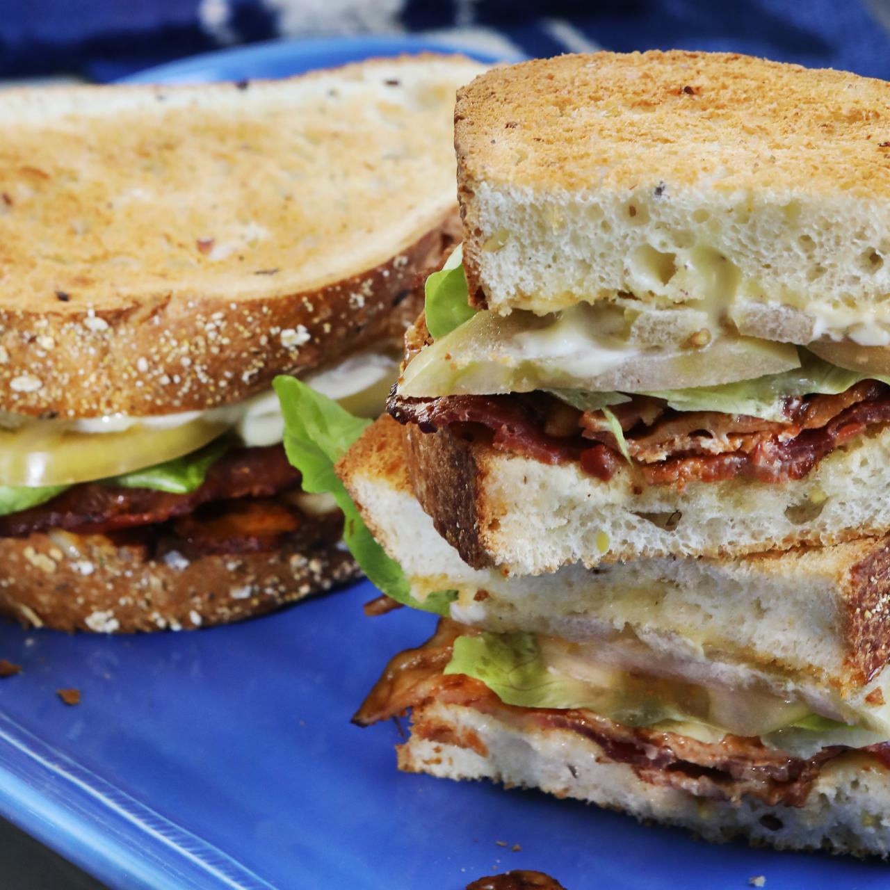 https://food.fnr.sndimg.com/content/dam/images/food/fullset/2022/06/30/QK703-kardea-brown-fancy-blt-with-pickled-tomatoes_4x3.jpg.rend.hgtvcom.1280.1280.suffix/1656603920211.jpeg