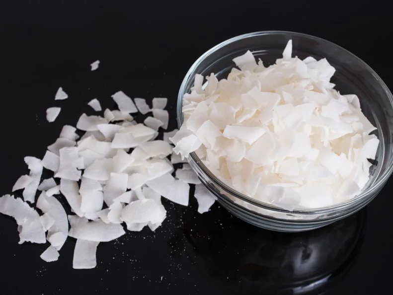 Dry Coconut Flakes in glass bowl