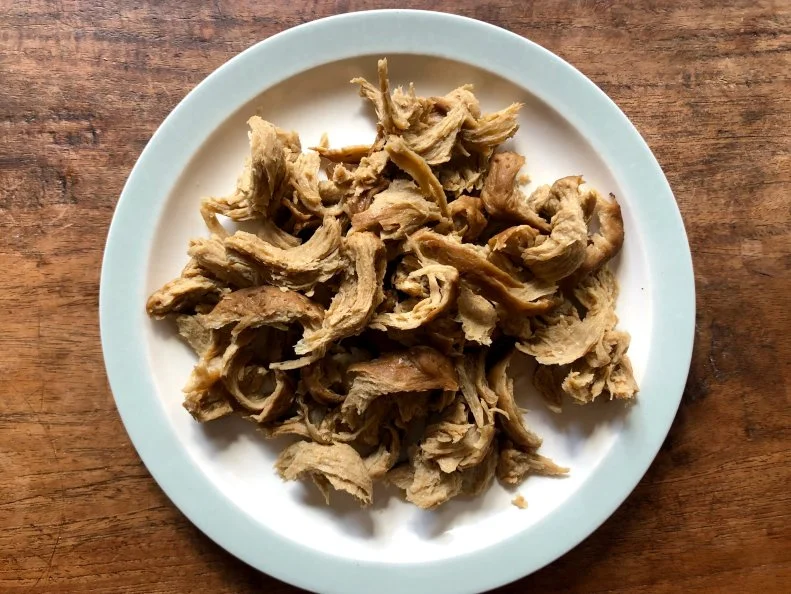 Homemade seitan 'chicken' (fickun), made from flower, water and seasoning. 'Washing the flower method.' It makes a very realistic looking (and even tasting) meat substitute.This is the stage where the steamed dough has been pulled apart to look like pieces of chicken.