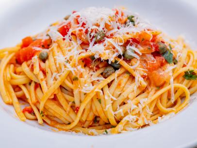 Host Michael Symon's One Pan Pasta, as seen on Symon's Dinners Cooking Out, Season 3.