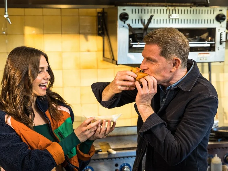 Host Bobby and Sophie Flay learn how to make the lobster roll with uni and caviar, at Broad Street Oysters with owner Christopher Tompkins, in Malibu, CA, as seen on Bobby and Sophie Take the Coast, Season 1.