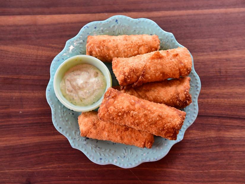 Close-up of Bacon Mac & Cheese Eggrolls with Quick Ranch, as seen on The Pioneer Woman, season 31.