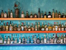 near Puerto Vallarta, Jalisco, Mexico --- Wall of different tequila bottles at Mister Tequila tasting gallery --- Image by Â© Holger Leue/Corbis
