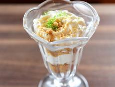 Ree&rsquo;s parfaits consist of layers of crumb followed by a mix of fluffy whipped cream cheese and heavy cream. The addition of coconut chips and extract, plus lime, gives the parfaits a truly tropical flavor.