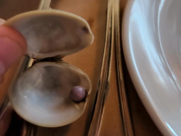 Couple Finds Rare Purple Pearl In A Restaurant Clam | FN Dish – Behind-the-Scenes, Food Trends, and Best Recipes : Food Network