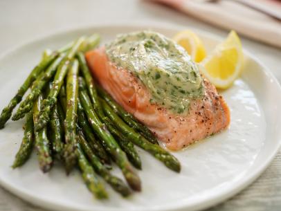 Geoffrey Zakarian makes his Salmon with Maitre D'Hotel Butter in the Microwave with Asparagus, as seen on The Kitchen, Season 31.