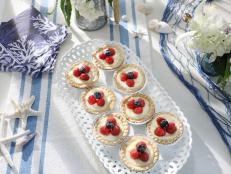 These little fruit tarts look like they're right out of a pastry shop. Frozen tart shells help speed up the process of making them. I like to use berries to top my tarts, but feel free to use whatever fruit you like.