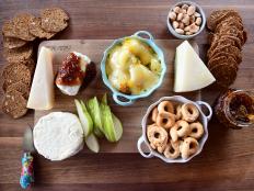 If you are putting together a cheese board, it&rsquo;s a good idea to have one or two featured components, then dress the other cheeses, biscuits and fruit around it. Enter Ree&rsquo;s baked fontina and jam-adorned goat cheese.