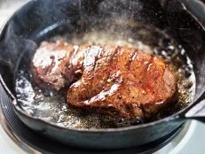 Angus teak fried on vegetable oil on iron cast